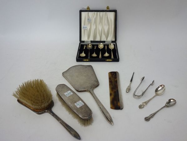 Silver and silver mounted wares, comprising; a set of six coffee spoons, Sheffield 1971, with a case, a hand mirror, a clothes brush, a hairbrush and