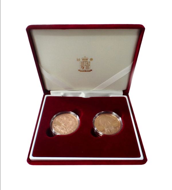 Two gold proof five pounds crowns, 2005, one commemorating The Battle of Trafalgar, the other commemorating Horatio Nelson, with two certificates, boo