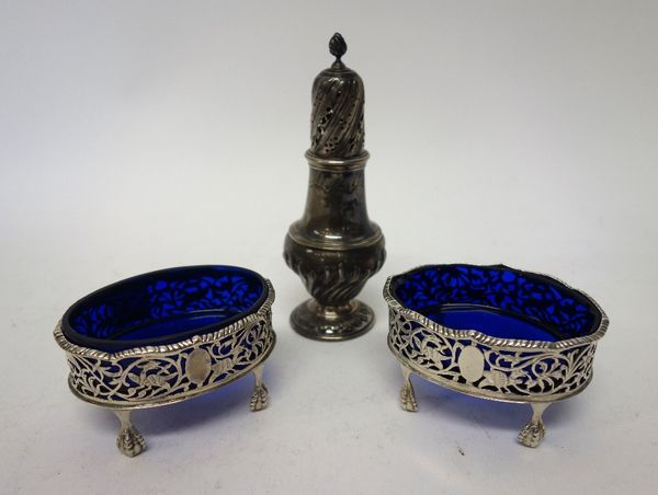 Silver, comprising; a pair of late Victorian silver salts, each of oval form, with scroll pierced and engraved decoration, within a shaped rim, raised