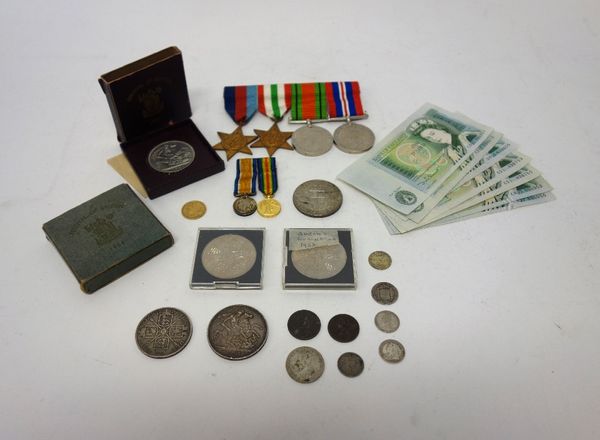 A Victoria old head half sovereign 1893, five crowns, comprising; 1887, 1937, 1951 with the original box and two 1953, an empty box for a 1951 crown,