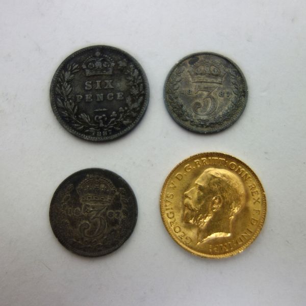 A George V half sovereign, 1914, a Victoria Jubilee head sixpence, 1887 and two Victoria Jubilee head threepences, both 1887, (4).