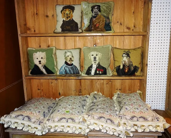 A group of 20th century needlework cushions, including examples of portrait dogs, (qty). J10