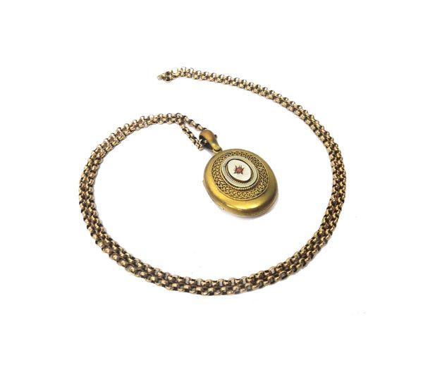 A gold circular link neckchain, on a sprung hook shaped clasp, detailed 9 K and a Victorian gilt metal and coral set oval pendant locket, with wirewor