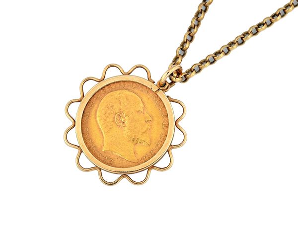 An Edward VII half sovereign 1906, in a 9ct gold pendant mount, decorated with a pierced looped border, with a 9ct gold circular link neckchain, fitte