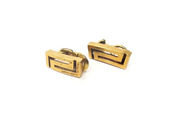 Two similar earclips, each in a differing pierced rectangular design, with differing back fittings, one detailed 18 CT, the other detailed 750, combin