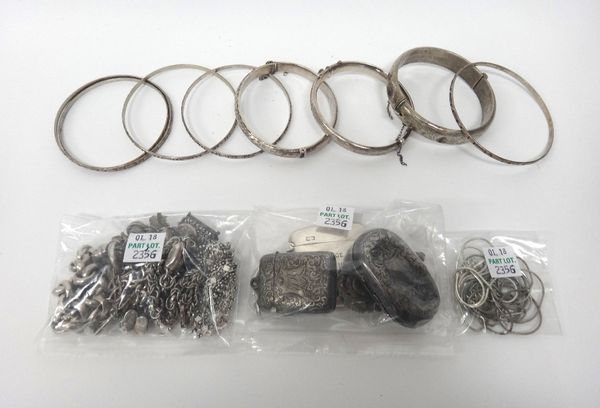 Mostly silver jewellery, comprising; two charm bracelets, three further bracelets, four hinged bangles, five similar circular bangles, two vesta cases