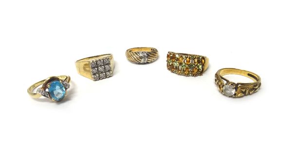 A 9ct gold and diamond set ring, in a ridged design, mounted with a row of five small diamonds and four 9ct gold and gem set rings, in a variety of de