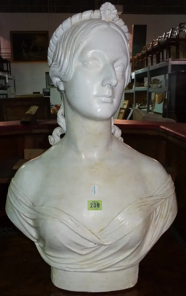 A 20th century white painted plaster bust of a female, 65cm high. H6