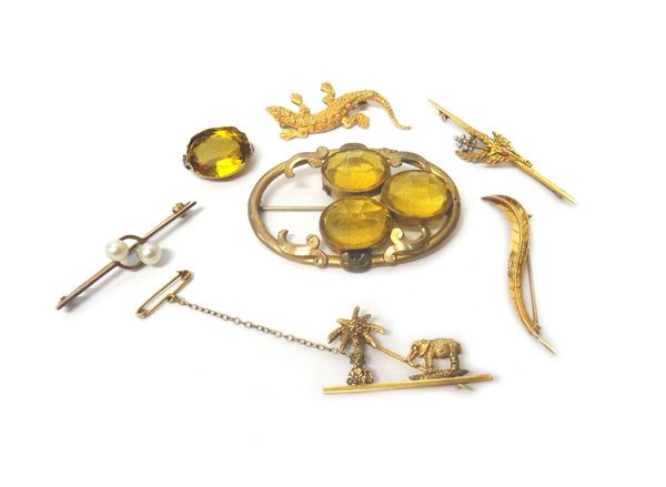 A gold brooch, designed as an elephant with a palm tree, a gold brooch, designed as a lizard, a bar brooch mounted with two cultured pearls in a cross