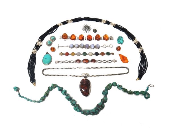 A single row necklace of graduated irregular turquoise matrix beads, a brooch in a similar design, another turquoise matrix brooch, a turquoise matrix