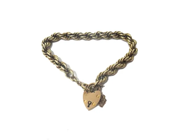 A 9ct gold ropetwist link bracelet, on a 9ct gold heart shaped padlock clasp, engraved with the initial C, weight 12 gms.