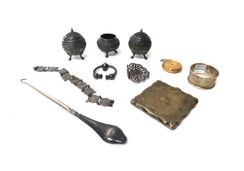 A lady's gold cased, key wind, openfaced fob watch, with an unsigned movement, base metal inner case, the outer case detailed 18 K, a bracelet made fr