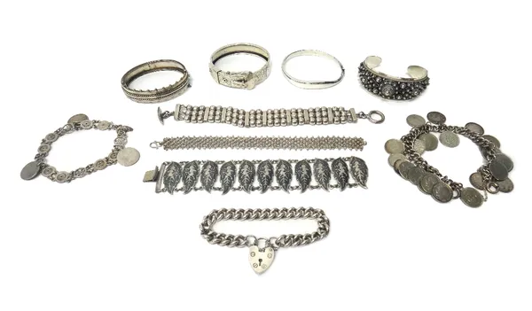 A silver curb link bracelet, with a heart shaped padlock clasp, detailed Sterling Silver, a niello bracelet, the links formed as leaves, decorated wit