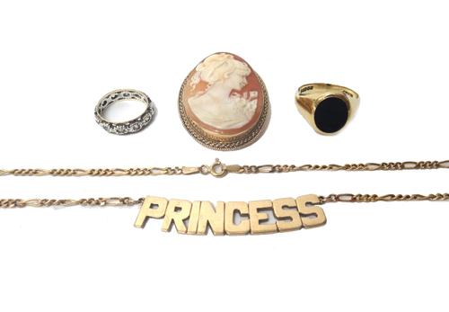 A 9ct gold and black onyx gentleman's oval signet ring, ring size U, a 9ct gold mounted oval shell cameo pendant brooch carved as the portrait of a la