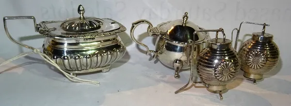 Silver items, comprising; a rectangular mustard pot, a circular mustard pot and a pair of salt and pepper casters, (4)  CAB