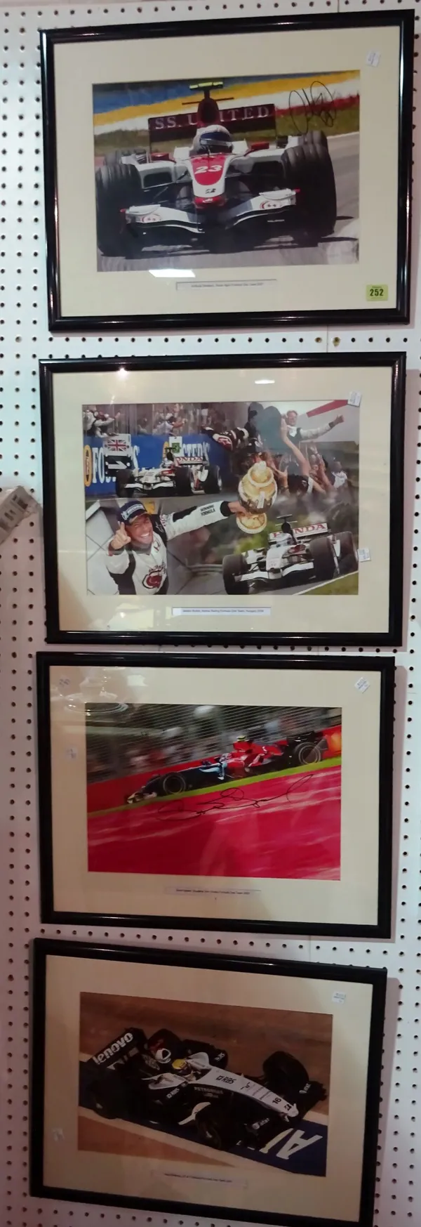 A group of four Formula One framed photos; Anthony Davison, Jenson Button, Scott Speed and Nico Rosberg (4). C1