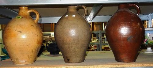 A group of three early 20th century stoneware flagons, approx. 45cm high, (3)  S3