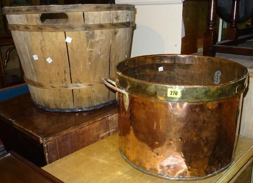 An early 20th century coopered wooden bucket, and a copper and brass twin handled bucket, (2)   J8