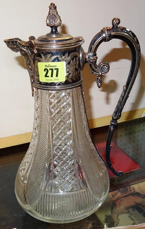 Collectables, including; a silver plated claret jug, a silver plated twin bottle stand, a ladle, miniature books, a Victorian commemorative enamelled