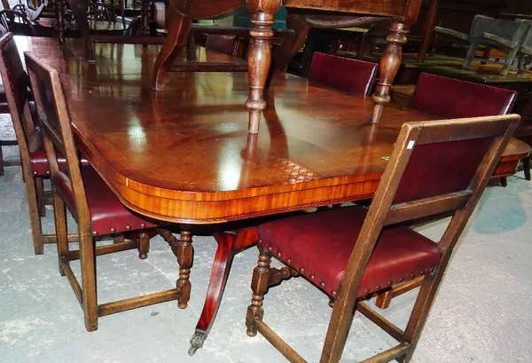 A large 20th century mahogany twin pillar dining table, on outswept supports, 300cm long x 88cm high. Please note that this lot is subject to VAT on t
