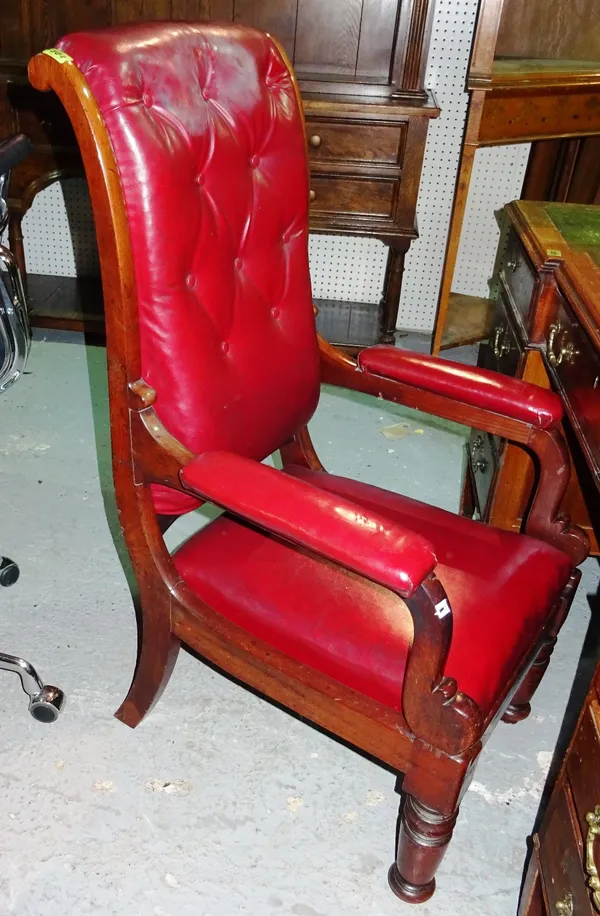 A Victorian mahogany framed red leather desk chair and a similar dining chair, (2). Please note that this lot is subject to VAT on the hammer   F10