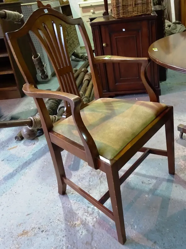 A set of six reproduction mahogany dining chairs, including a pair of carvers, (6). Please note that this lot is subject to VAT on the hammer    D9