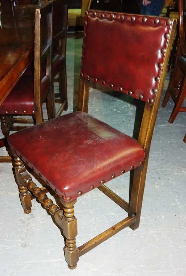 A matched set of nine oak dining chairs, in the late 17th century style, (9). Please note that this lot is subject to VAT on the hammer   H9