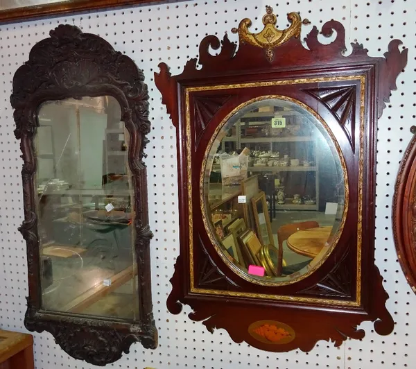 An Edwardian carved and gilded mirror, 60cm wide and a George I style carved mirror, 44cm wide, (2).  A4