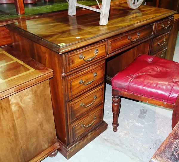 A 20th century mahogany kneehole desk, 110cm wide x 77cm high. G10