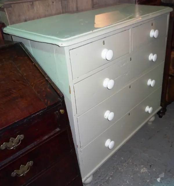 A 20th century grey painted pine chest of drawers with two short and three long drawers, 97cm wide x 94cm high.  J8