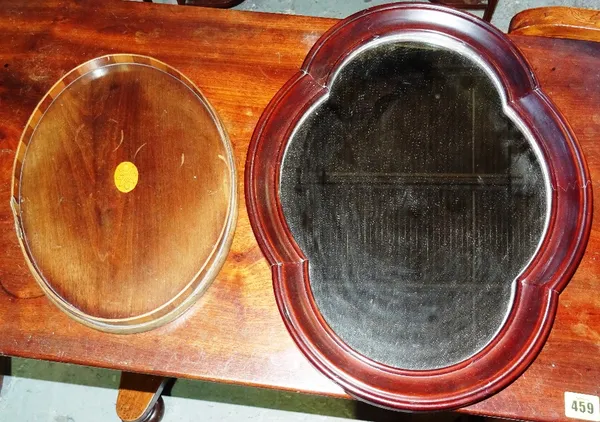 An early 20th century walnut rectangular wall mirror and a small galleried tray, (2). I4