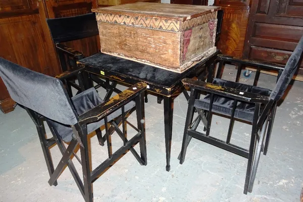 A black painted folding table, with Chinoiserie decoration and four matching Director style folding chairs, (5).  M10