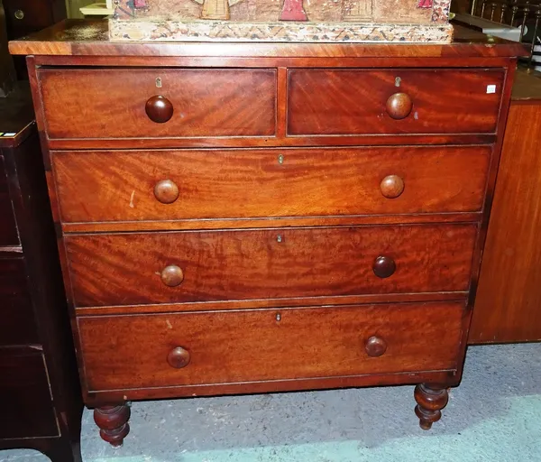 A 19th century mahogany chest of drawers with two short and three long drawers, on turned supports, 106cm wide x 110cm high.   J7