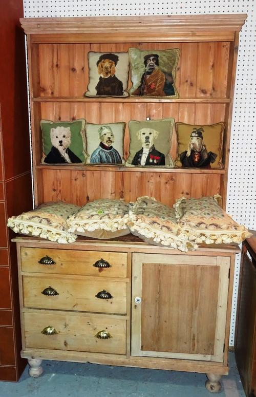 An early 20th century pine dresser, with three long drawers and cupboard base, with two tier shelf top, 120cm wide x 209cm high.   J11