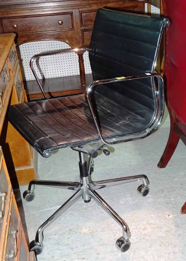 An Eames style leather office chair.  F10