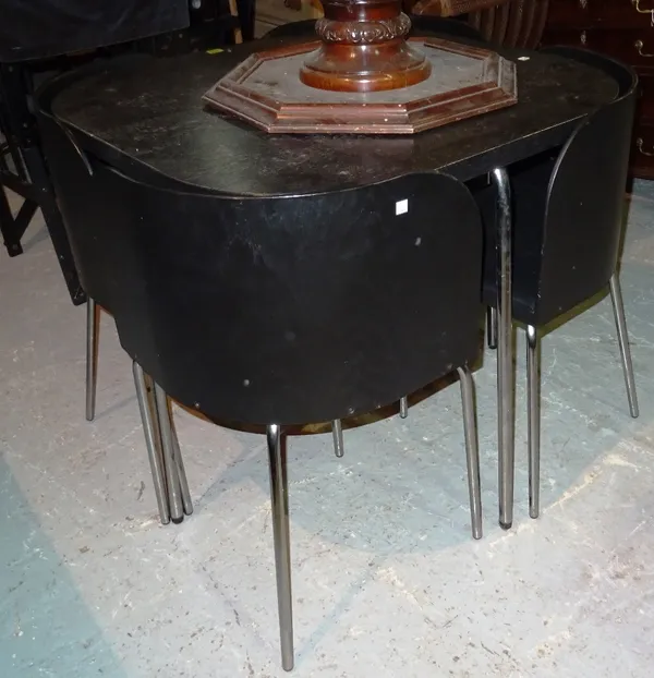 A 20th century chrome and ebonised kitchen dining table, with four integral dining chairs, 84cm wide x 76cm high, (5).   J10