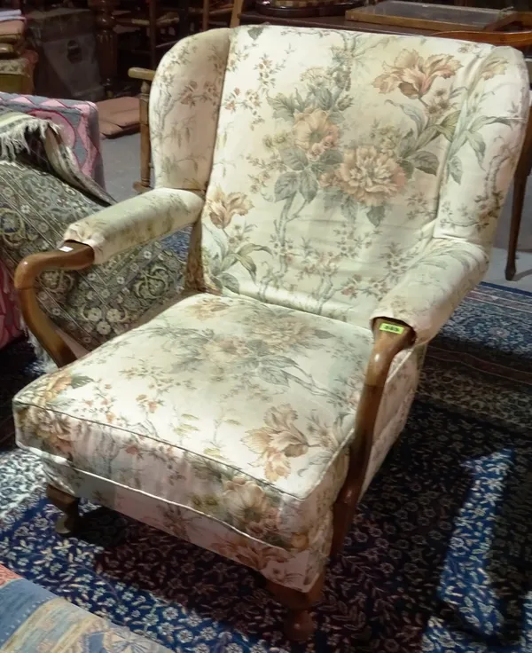 A pair of early 20th century Dutch walnut open armchairs, on scroll supports.   I5