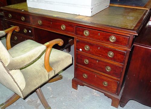 An early 20th century mahogany twin pedestal desk, with tooled leather inset top, 154cm wide x 82cm high.  F10