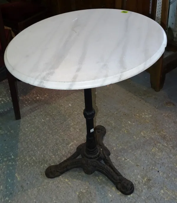 An early 20th century circular white marble occasional table, with cast iron base, (a.f.).   A8