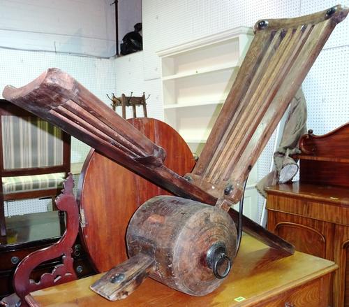 An early 20th century hardwood African folding chair, with high back and low seat.   D10