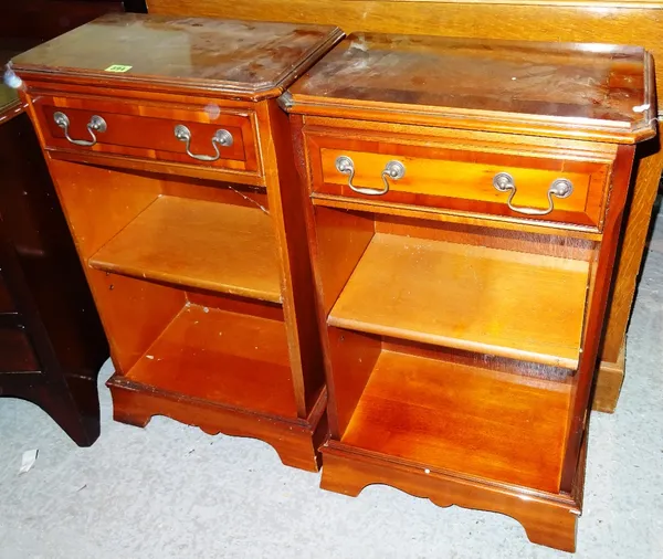 A pair of 20th century yew wood bedside cupboards, 45cm wide x 76cm high.   F10