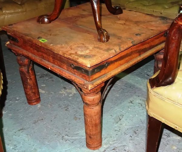 A 20th century stained pine and iron bound rectangular coffee table, 61cm wide x 46cm high.  I7