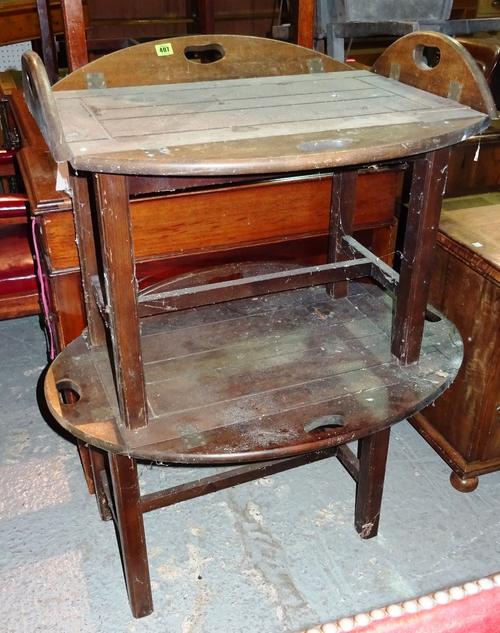 A pair of early 20th century mahogany butler's trays on stands, 70cm wide x 50cm high, (2).  G10