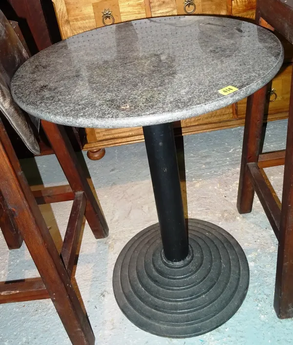 A group of three 20th century occasional tables, with granite top on turned circular bases, 59cm wide x 75cm high, (3).   B7