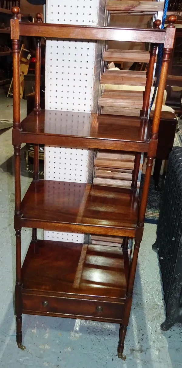 A 20th century mahogany four tier what-not, 49cm wide x 142cm high.   J6