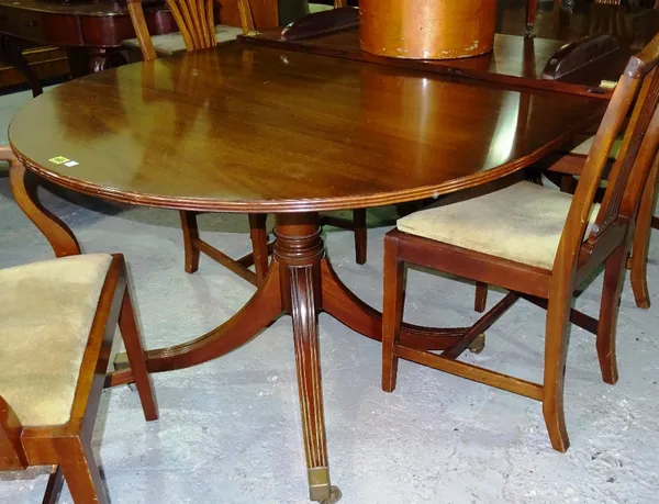 A 20th century mahogany 'D' end dining table, with two extra leaves, 174cm wide x 73cm high.   D9