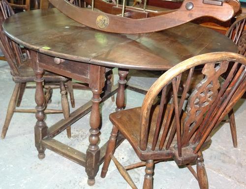 An 18th century and later oak gateleg dining table, with single drawer, 125cm wide x 76cm high   F9