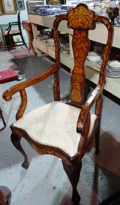 A 19th century Dutch walnut and marquetry inlaid open armchair, 117cm high.  J4