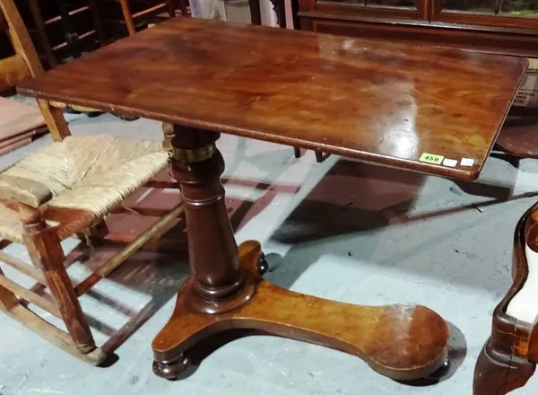 A Victorian mahogany height adjustable reading table.   J4