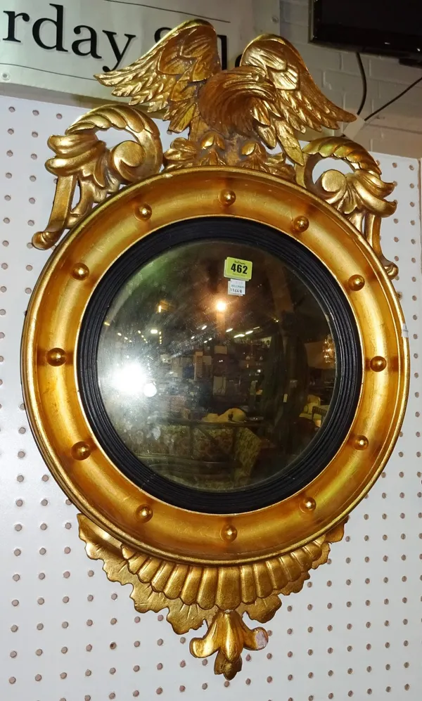 A George III style gilt framed convex wall mirror and a small composition plaster mirror (2).   B5